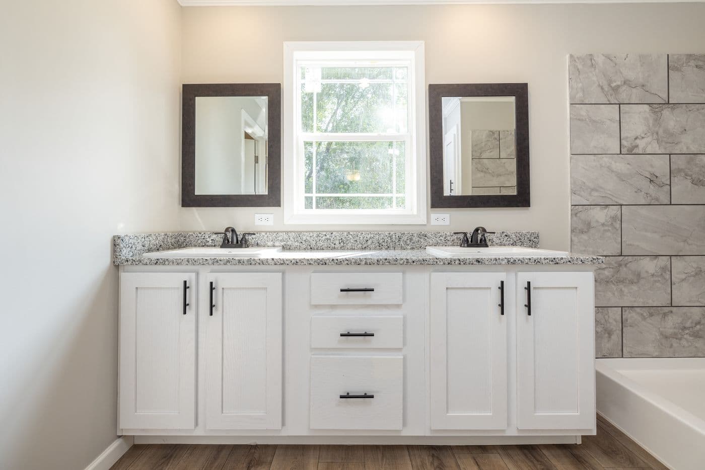 The HAWTHORNE Primary Bathroom. This Manufactured Mobile Home features 3 bedrooms and 2 baths.