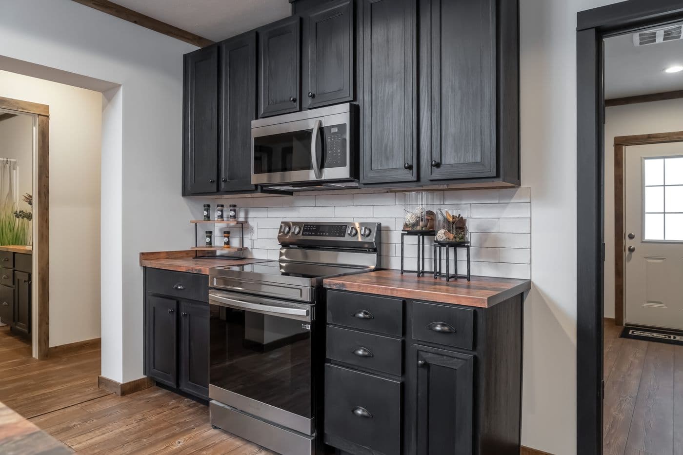 The THE MILL HOUSE Kitchen. This Manufactured Mobile Home features 3 bedrooms and 2 baths.