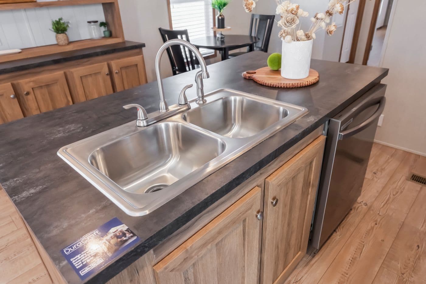 The SEAS THE DAY Kitchen. This Manufactured Mobile Home features 3 bedrooms and 2 baths.