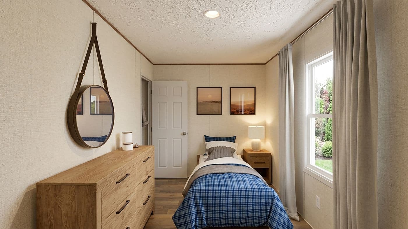 The ASPEN Bedroom. This Manufactured Mobile Home features 3 bedrooms and 2 baths.