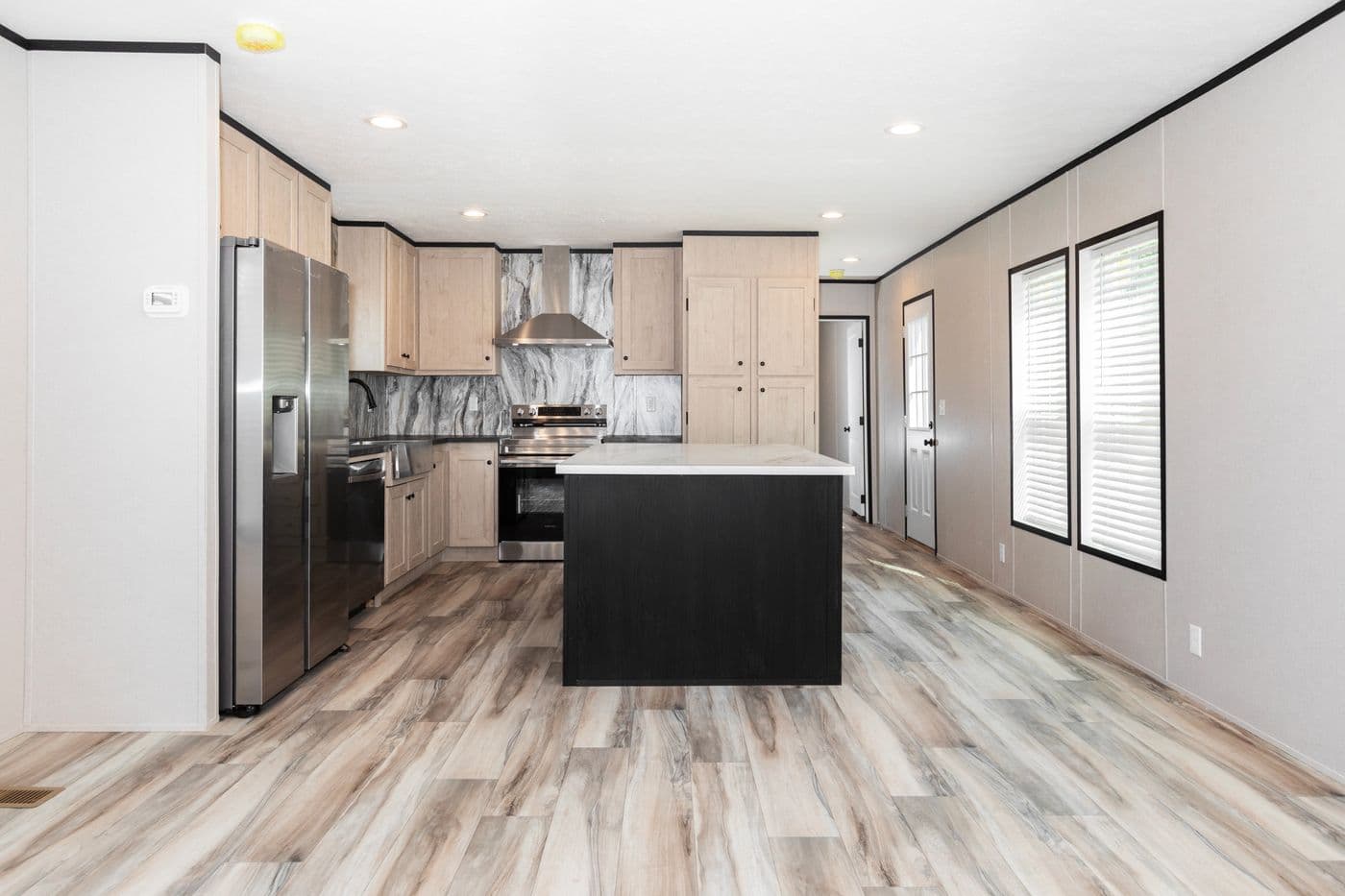 The THE FUJI Kitchen. This Manufactured Mobile Home features 3 bedrooms and 2 baths.