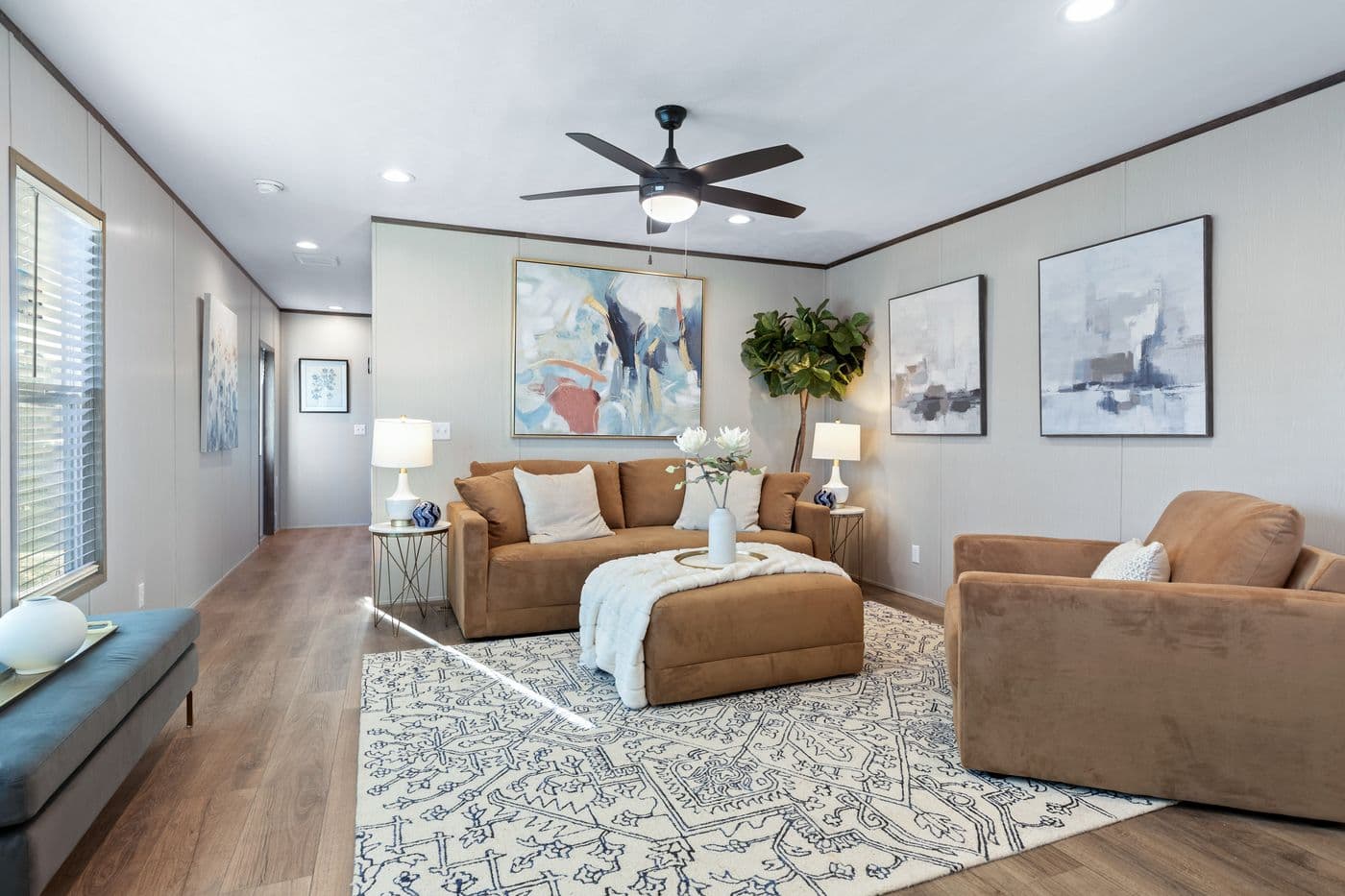 The RETREAT LIVING 16682A Living Room. This Manufactured Mobile Home features 2 bedrooms and 2 baths.