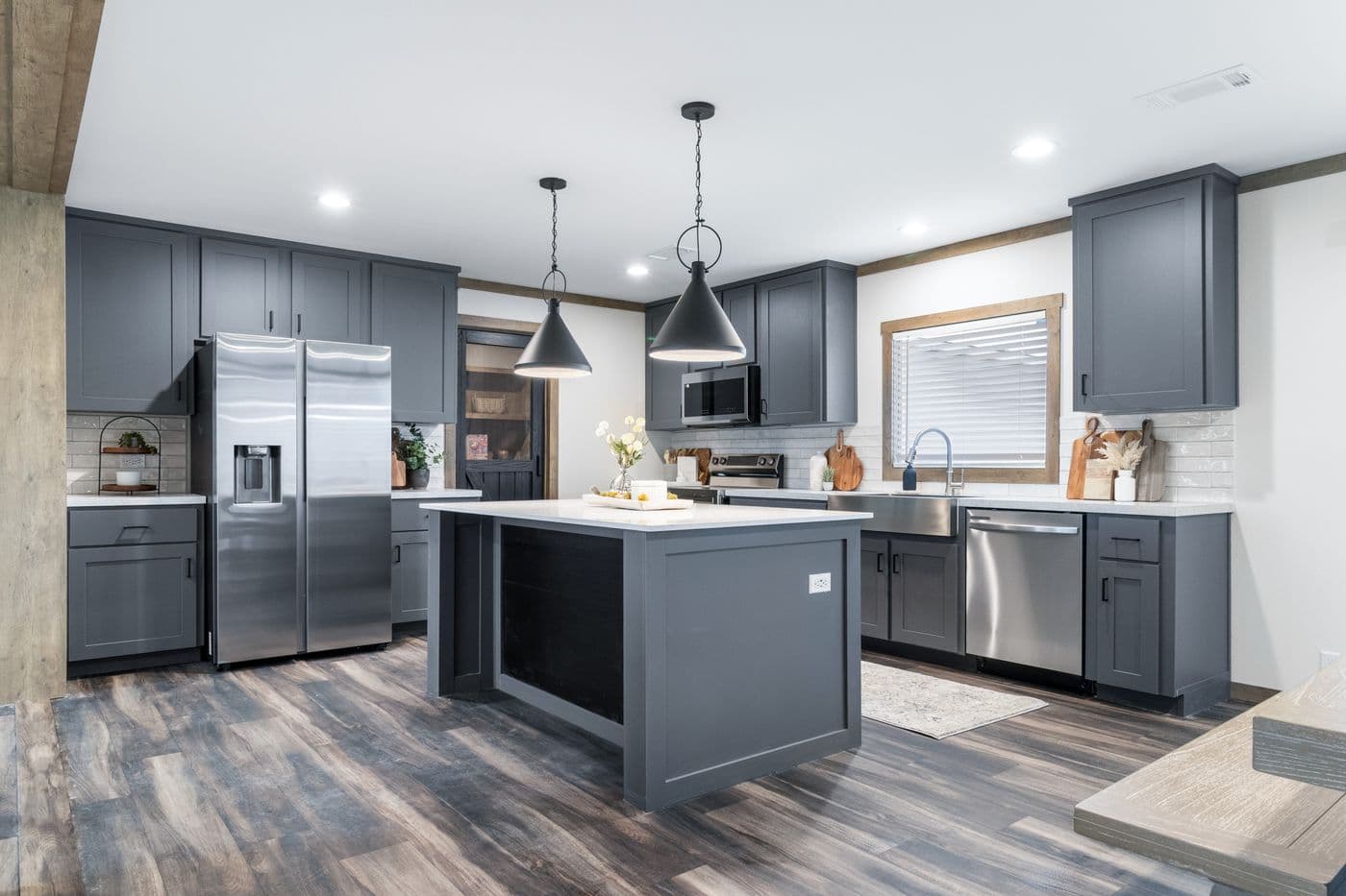 The EVERETT ELITE Kitchen. This Manufactured Mobile Home features 4 bedrooms and 3 baths.