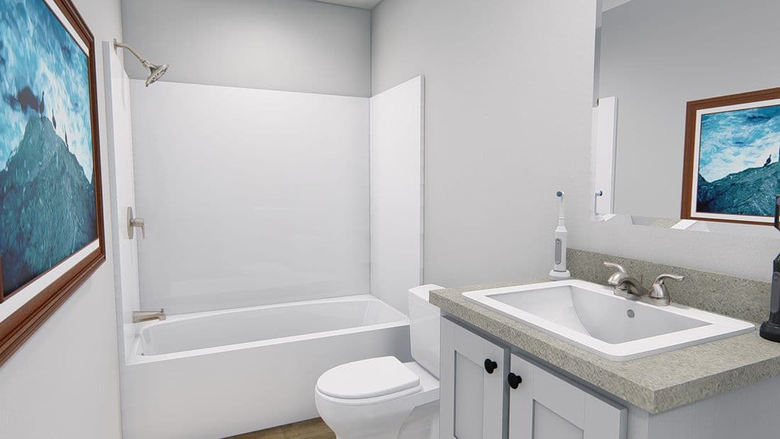 The AFRICA Guest Bathroom. This Manufactured Mobile Home features 3 bedrooms and 2 baths.