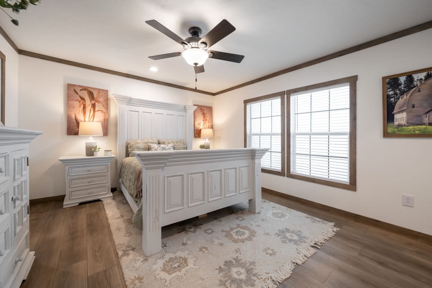 The THE LIZZIE Primary Bedroom. This Manufactured Mobile Home features 3 bedrooms and 2 baths.