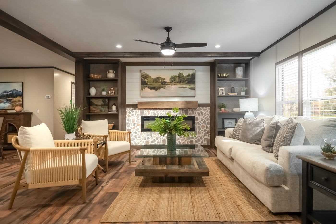 The MOUNTAIN VIEW Living Room. This Manufactured Mobile Home features 3 bedrooms and 2 baths.