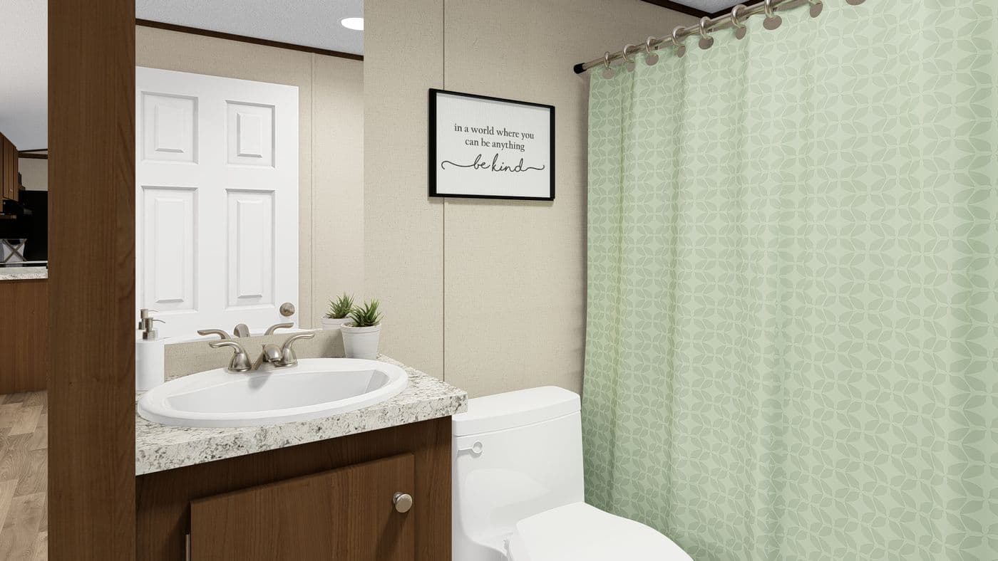 The DELIGHT Primary Bathroom. This Manufactured Mobile Home features 2 bedrooms and 2 baths.