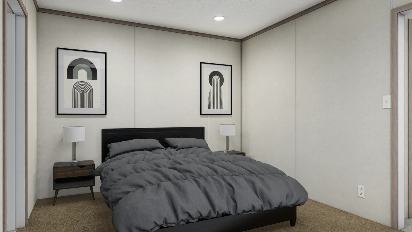 The 6016-4711 THE PULSE Primary Bedroom. This Manufactured Mobile Home features 2 bedrooms and 2 baths.