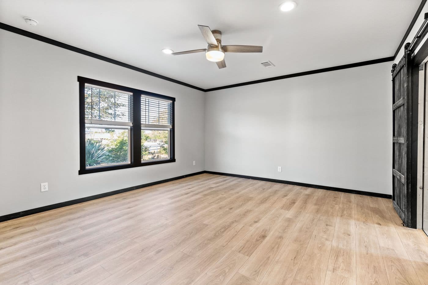 The THE SIERRA Living Room. This Manufactured Mobile Home features 4 bedrooms and 2 baths.