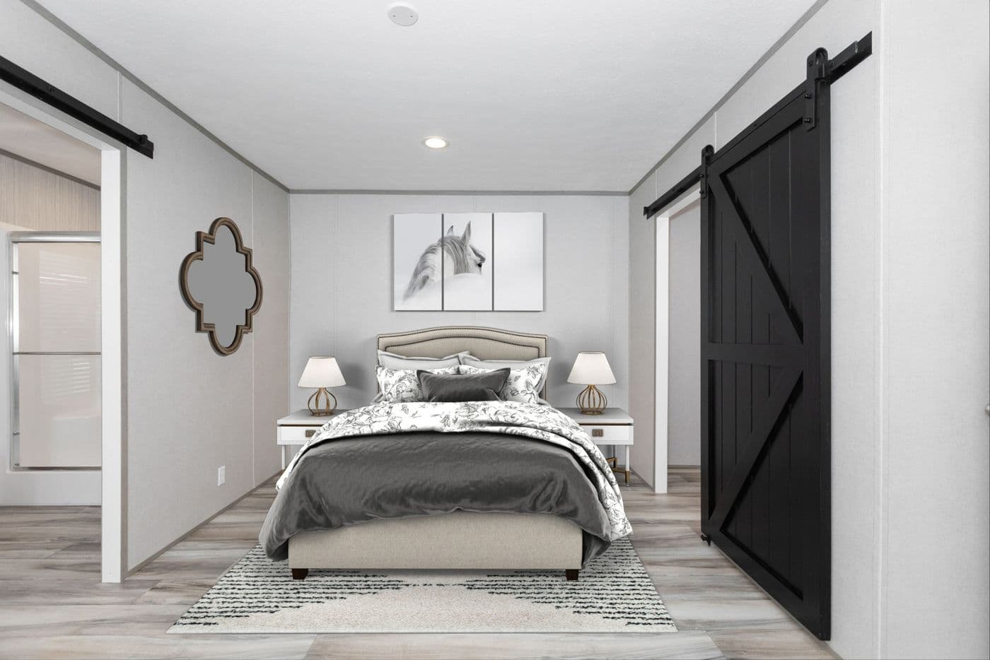 The THE OLYMPUS Primary Bedroom. This Manufactured Mobile Home features 3 bedrooms and 2 baths.