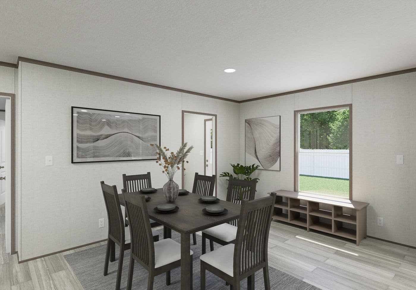 The THE MOUNTAINEER 64 Dining Room. This Manufactured Mobile Home features 3 bedrooms and 2 baths.