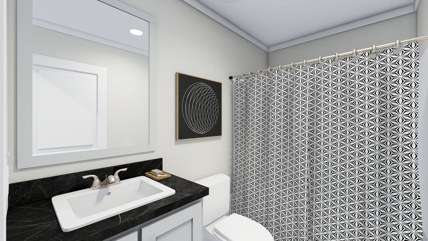 The CLASSIC 56D Guest Bathroom. This Manufactured Mobile Home features 3 bedrooms and 2 baths.