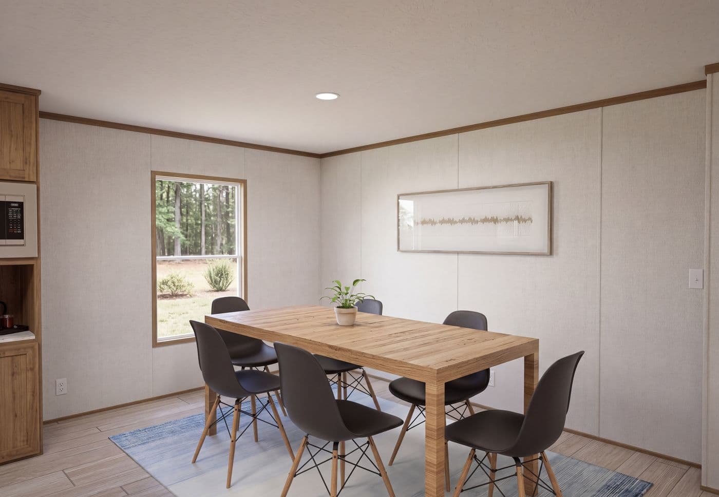 The THE MOUNTAINEER 68 Dining Area. This Manufactured Mobile Home features 4 bedrooms and 2 baths.