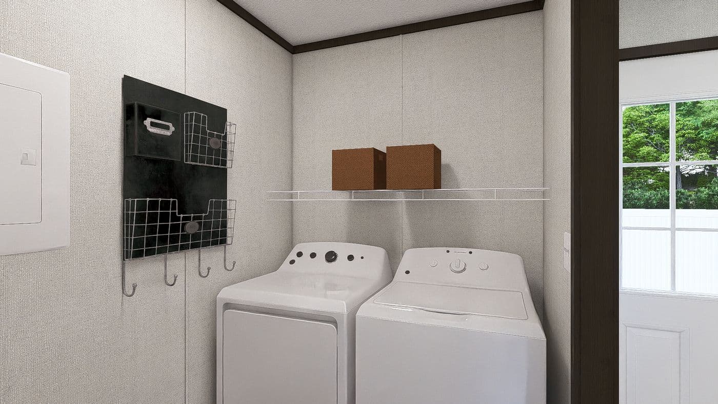 The COLOSSAL Utility Room. This Manufactured Mobile Home features 3 bedrooms and 2 baths.