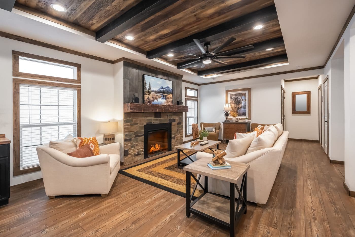 The THE MILL HOUSE Living Room. This Manufactured Mobile Home features 3 bedrooms and 2 baths.