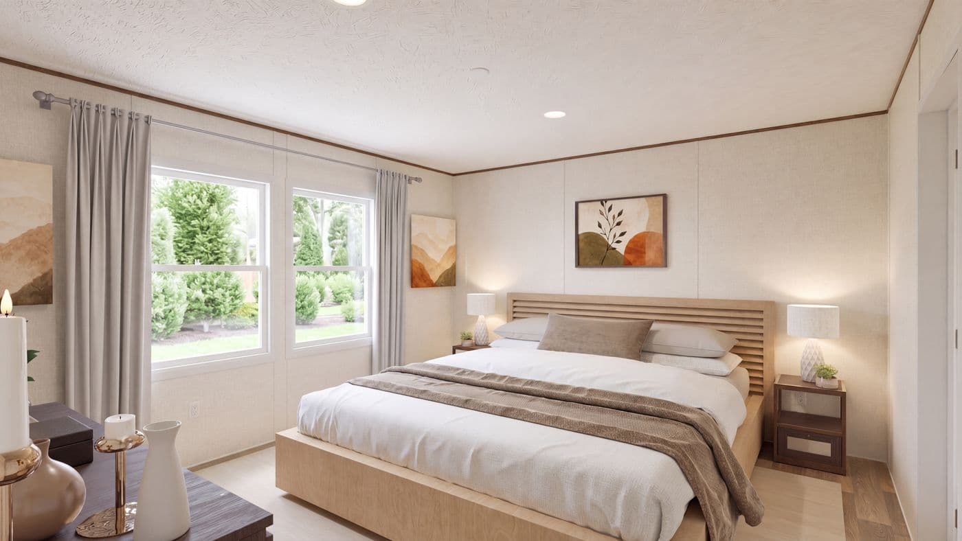 The OAK Primary Bedroom. This Manufactured Mobile Home features 4 bedrooms and 2 baths.