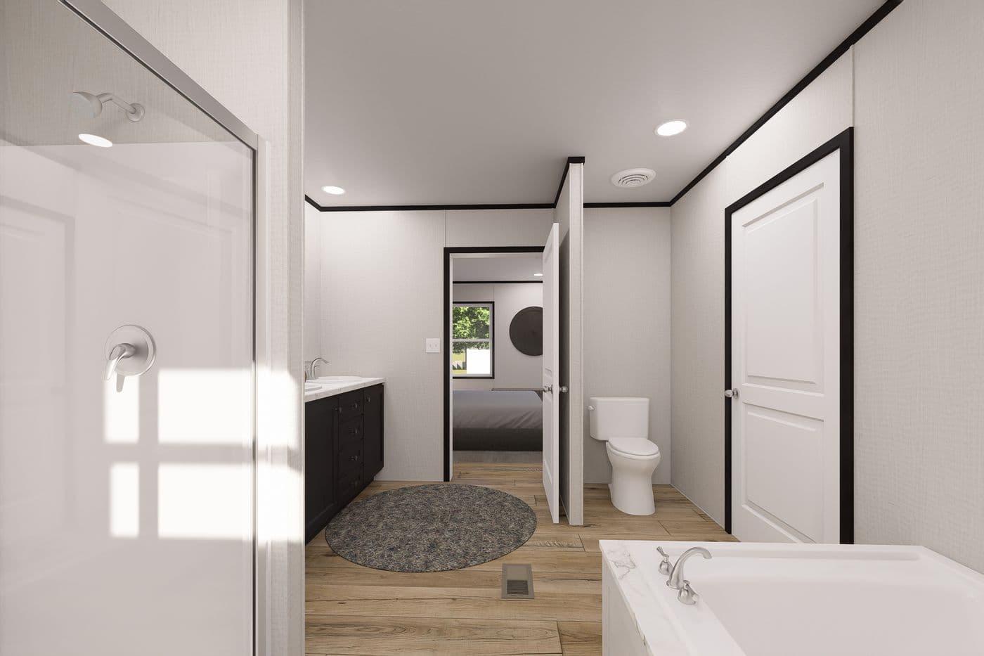 The ULTRA FLEX Primary Bathroom. This Manufactured Mobile Home features 3 bedrooms and 2 baths.