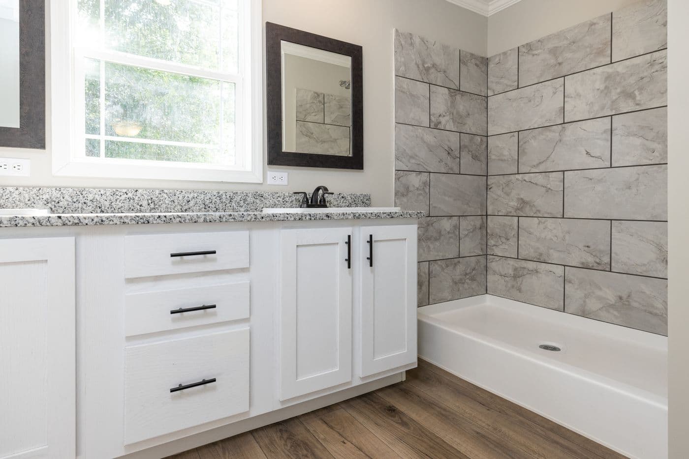 The HAWTHORNE Primary Bathroom. This Manufactured Mobile Home features 3 bedrooms and 2 baths.