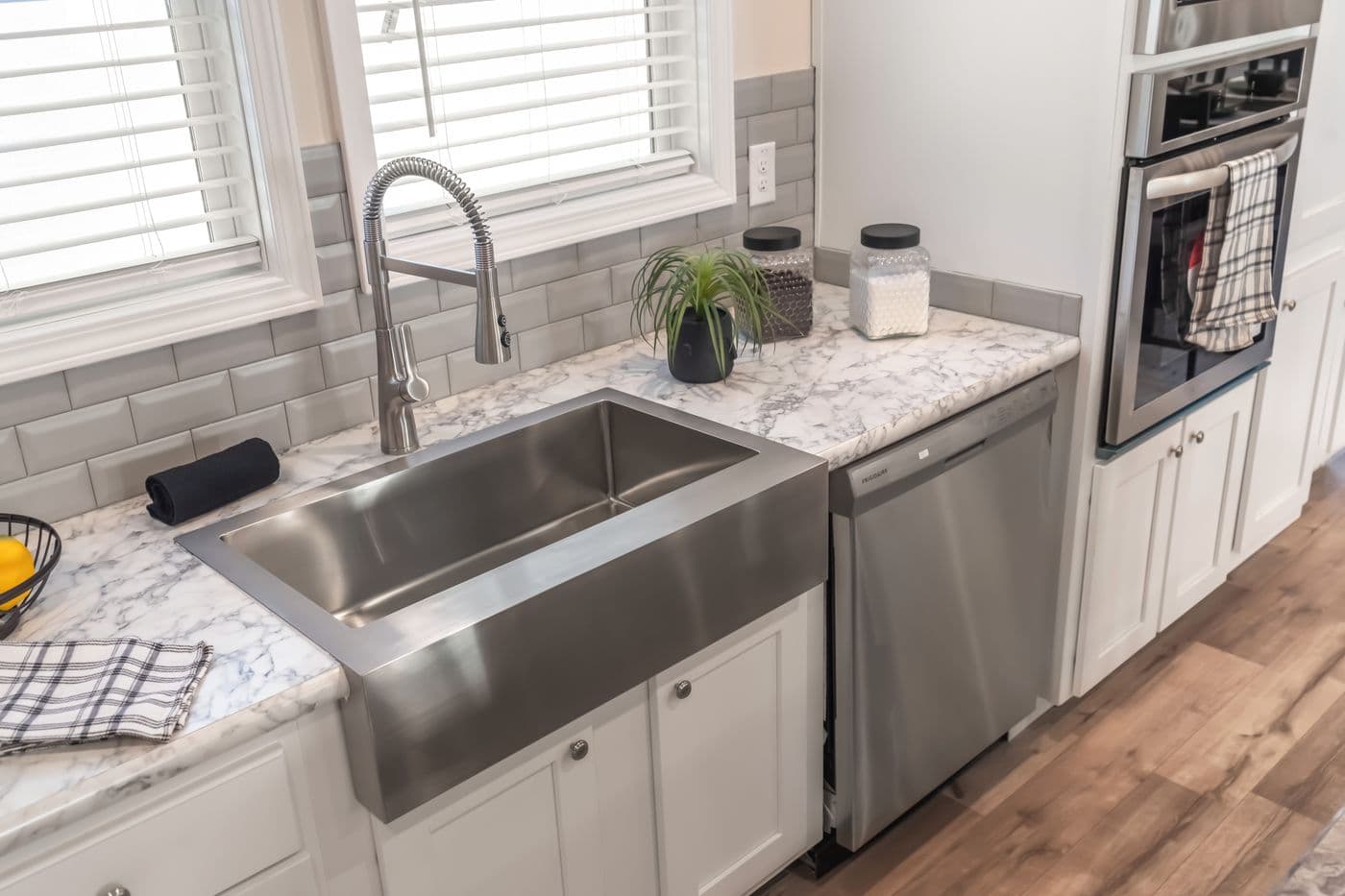 The SUPER 68 ELITE Kitchen. This Manufactured Mobile Home features 3 bedrooms and 2 baths.