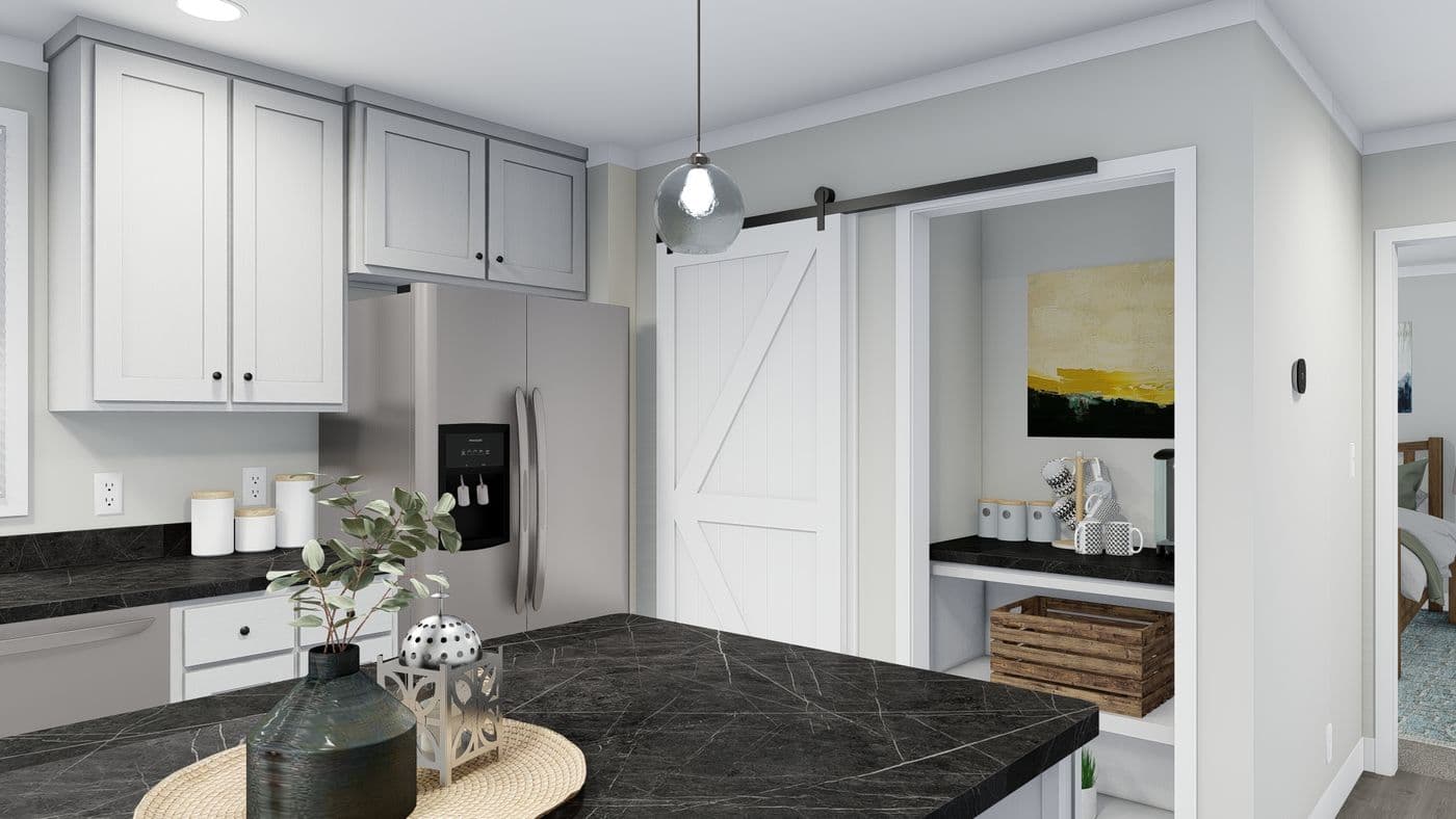 The THE BREEZE Kitchen. This Manufactured Mobile Home features 3 bedrooms and 2 baths.