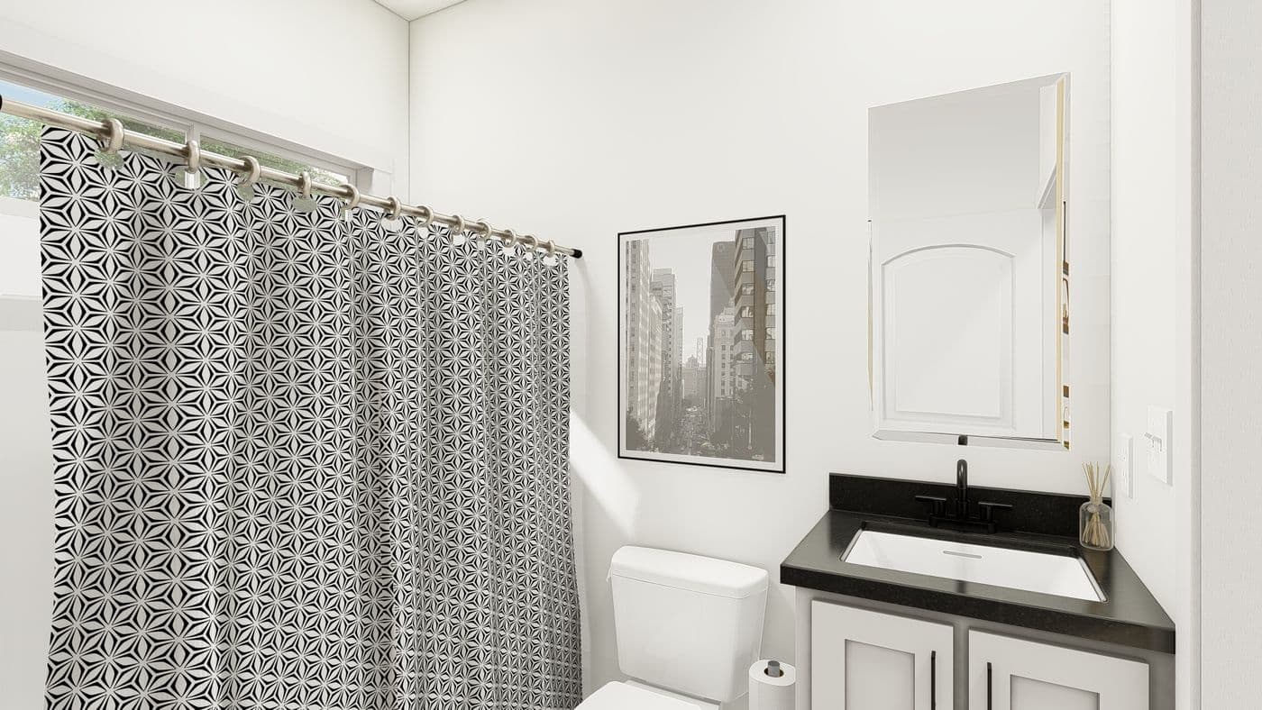 The HRR-1656-2A               CURE Guest Bathroom. This Manufactured Mobile Home features 2 bedrooms and 2 baths.