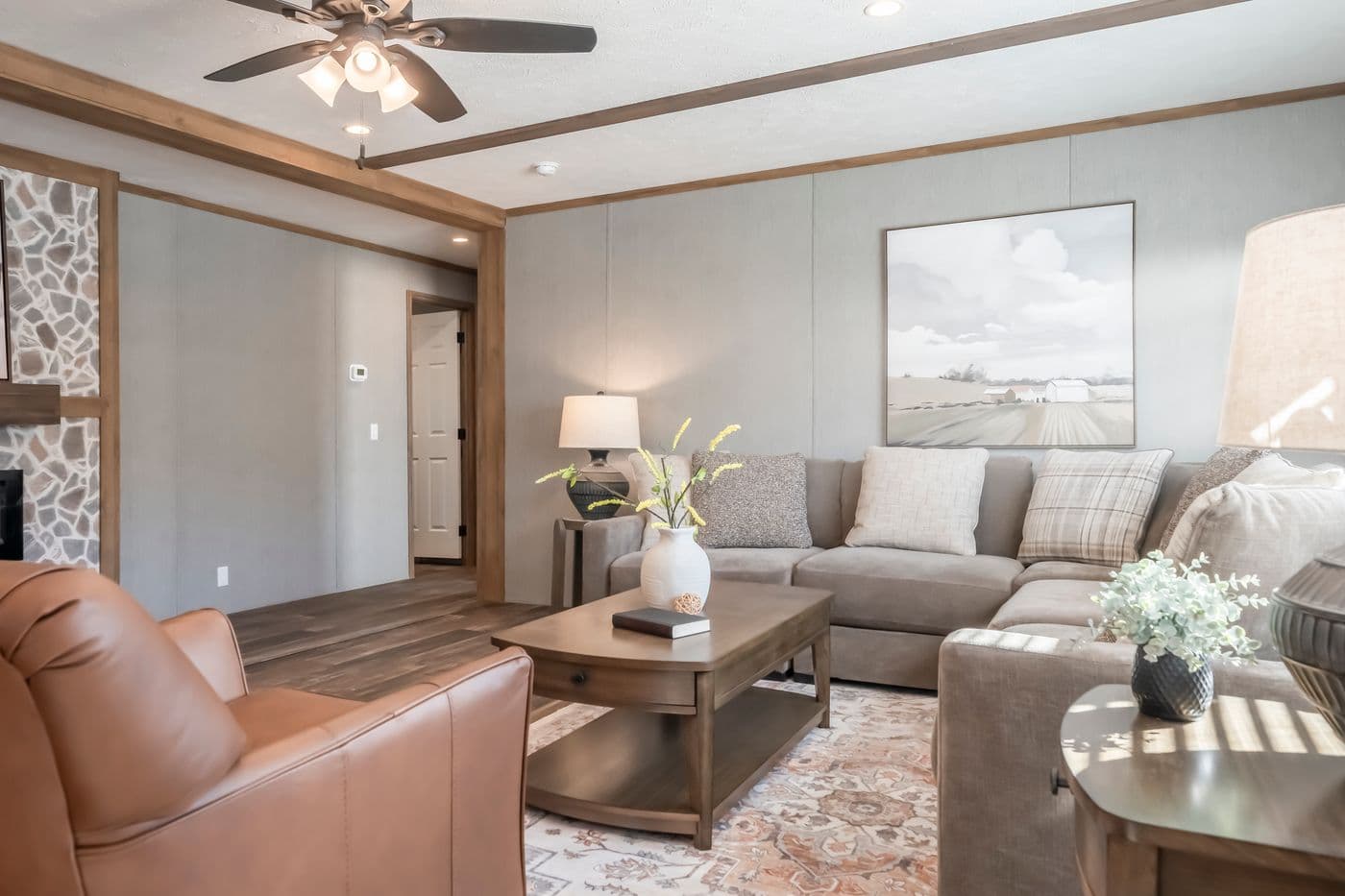 The BLACK DIAMOND Living Room. This Manufactured Mobile Home features 3 bedrooms and 2 baths.