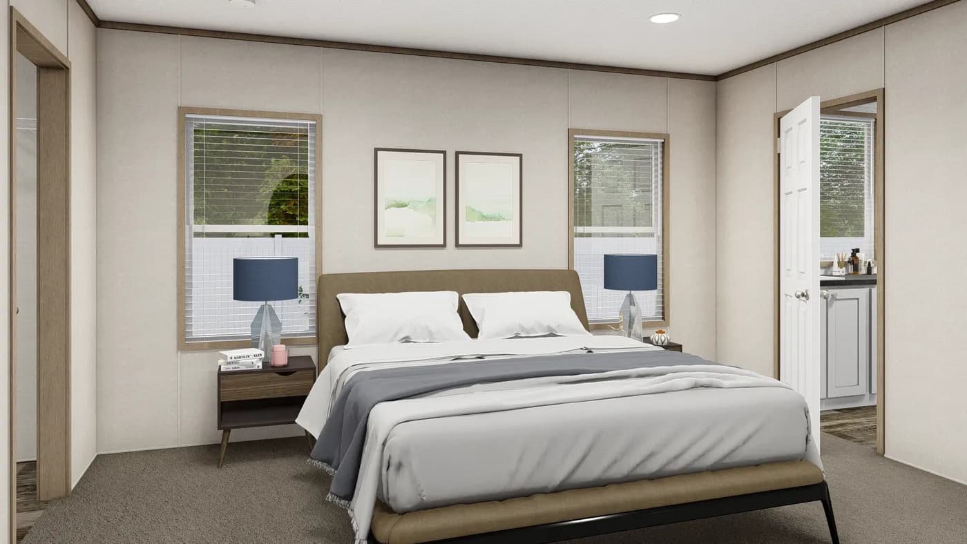 The THE SOUTHERN FARMHOUSE Primary Bedroom. This Manufactured Mobile Home features 3 bedrooms and 2 baths.