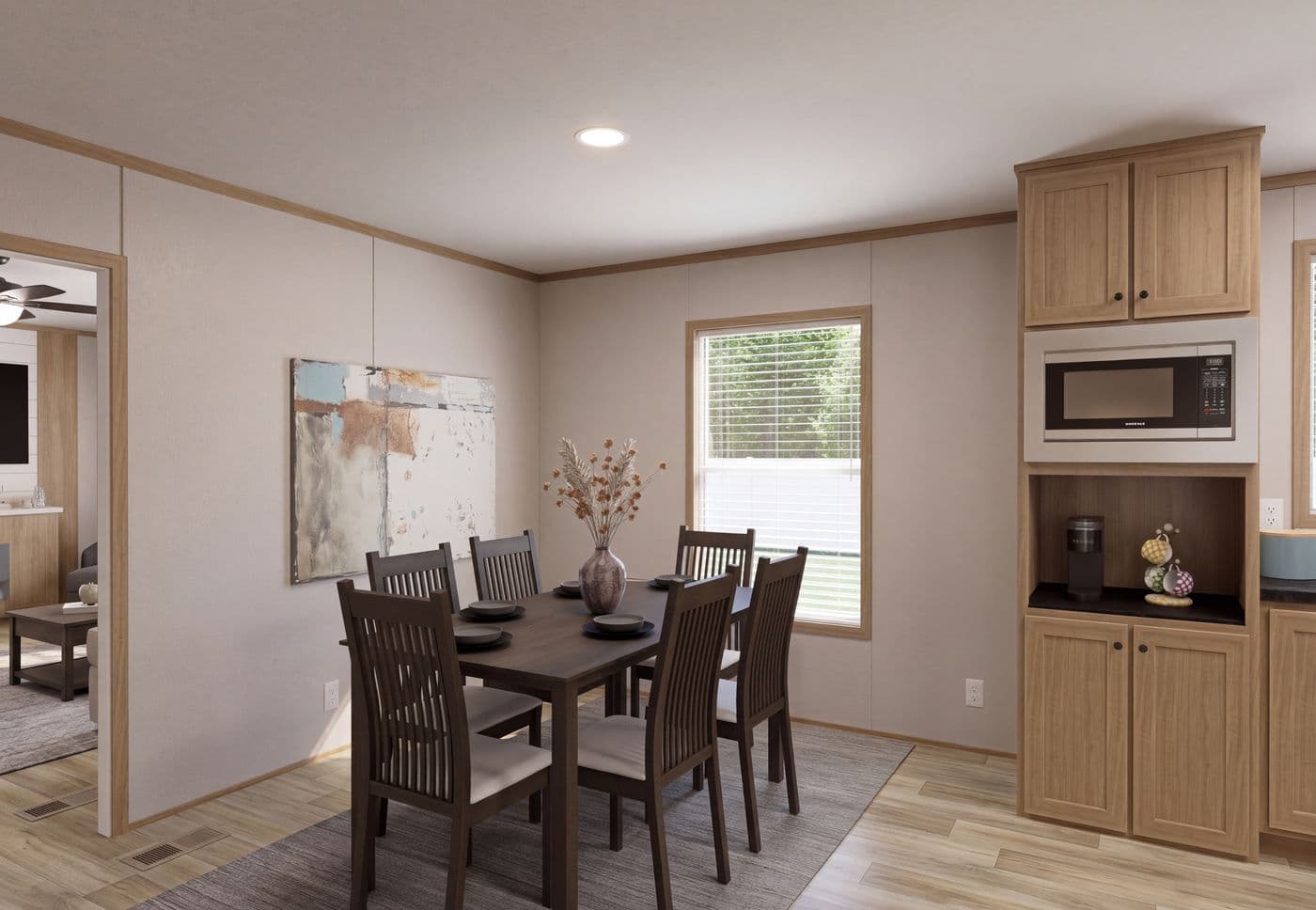 The THE MOUNTAINEER 72 Dining Area. This Manufactured Mobile Home features 3 bedrooms and 2 baths.