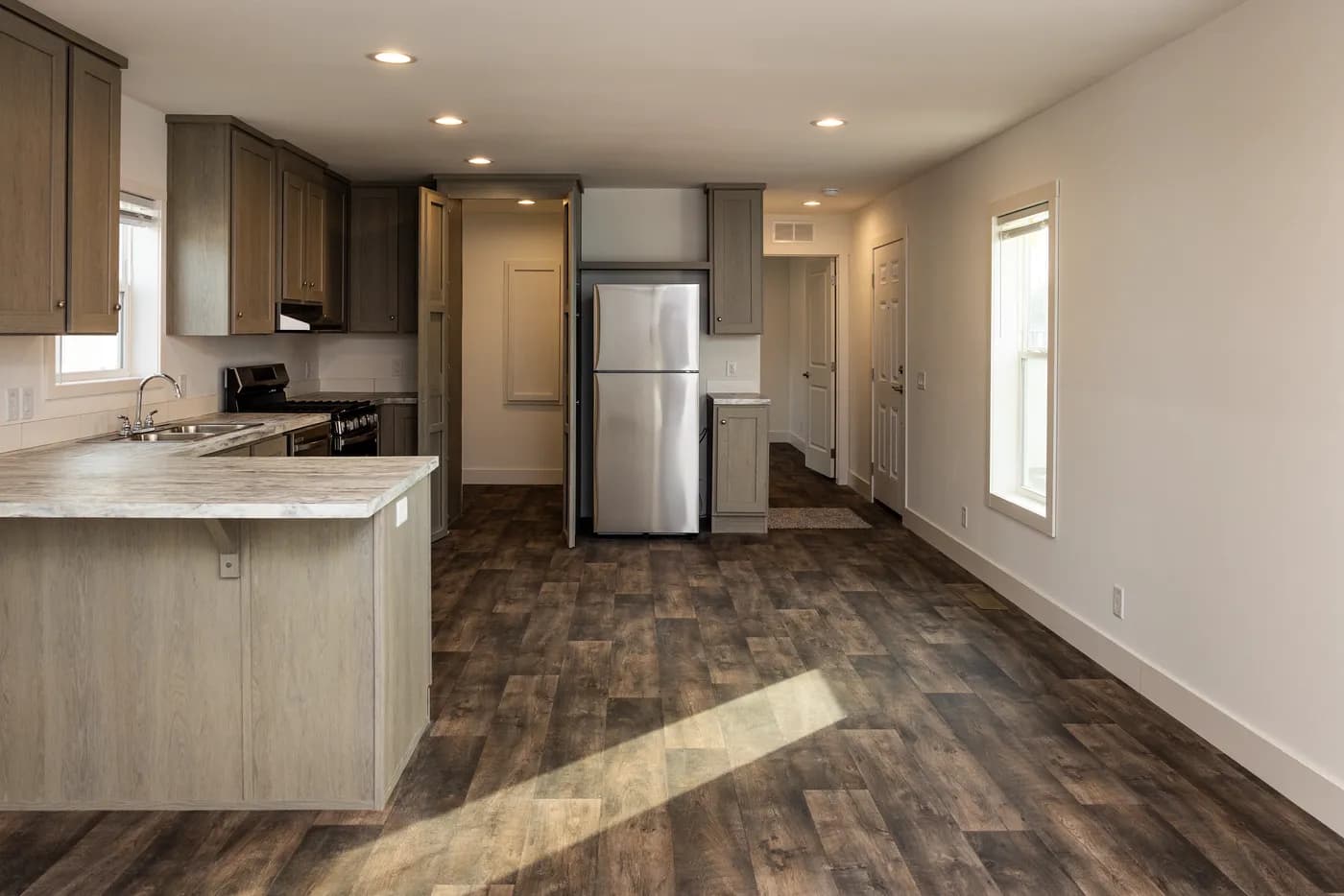 The RAMSEY 223 Kitchen. This Manufactured Mobile Home features 3 bedrooms and 2 baths.