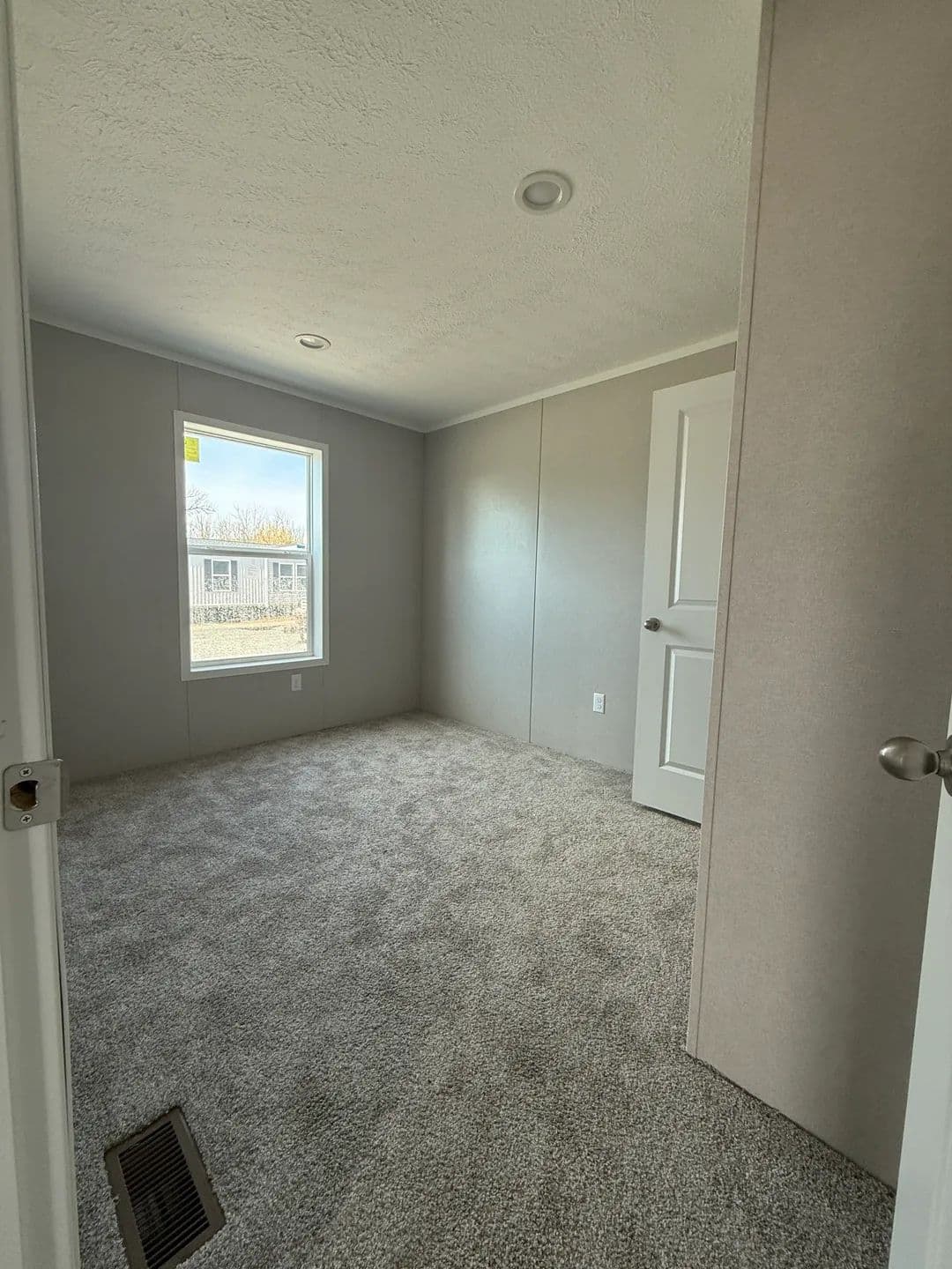 The ONYX Guest Bedroom. This Manufactured Mobile Home features 1 bedroom and 1 bath.