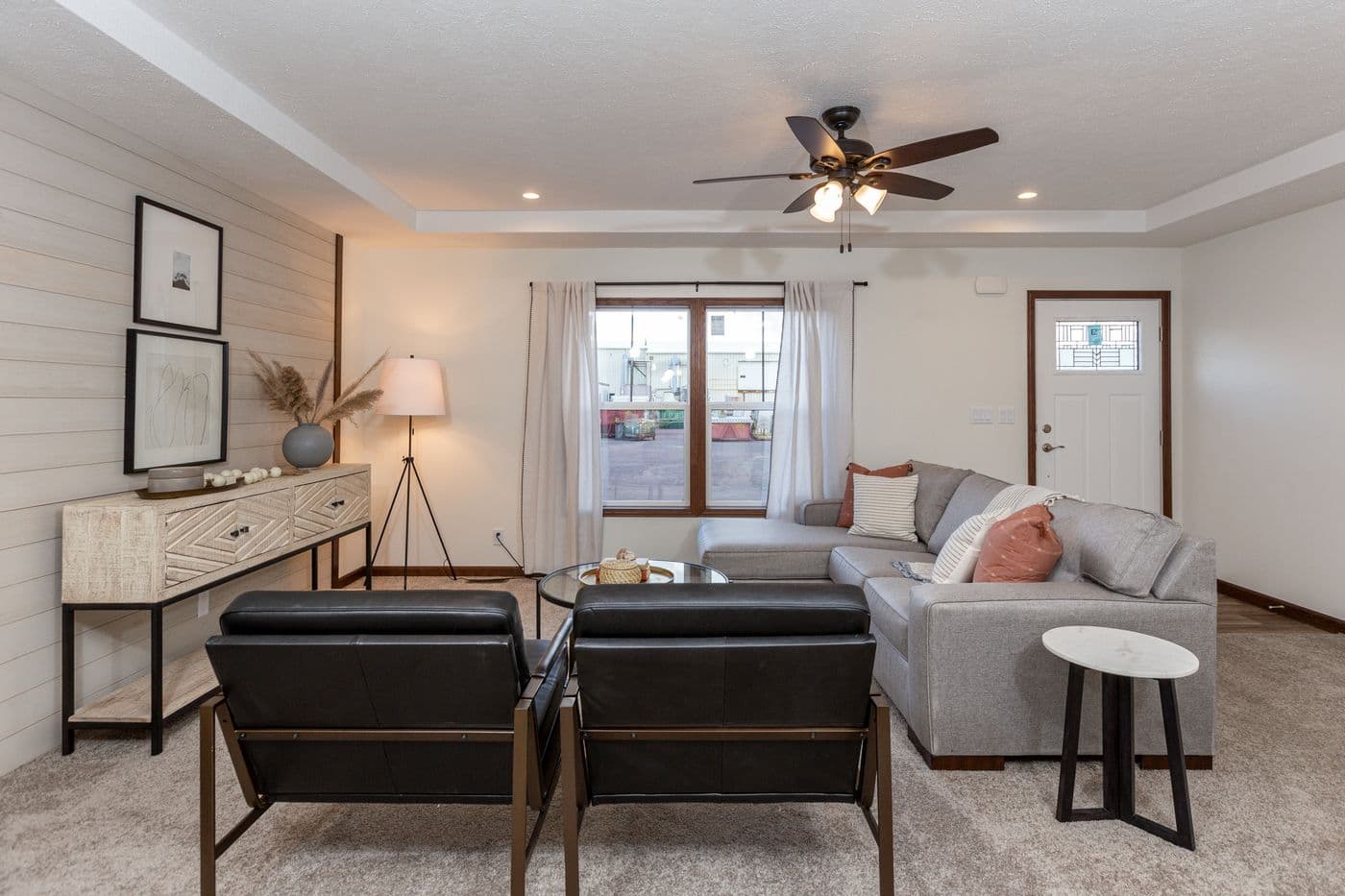 The LEGEND 86 Living Room. This Manufactured Mobile Home features 3 bedrooms and 2 baths.