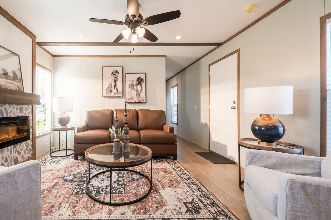 The SEAS THE DAY Living Room. This Manufactured Mobile Home features 3 bedrooms and 2 baths.