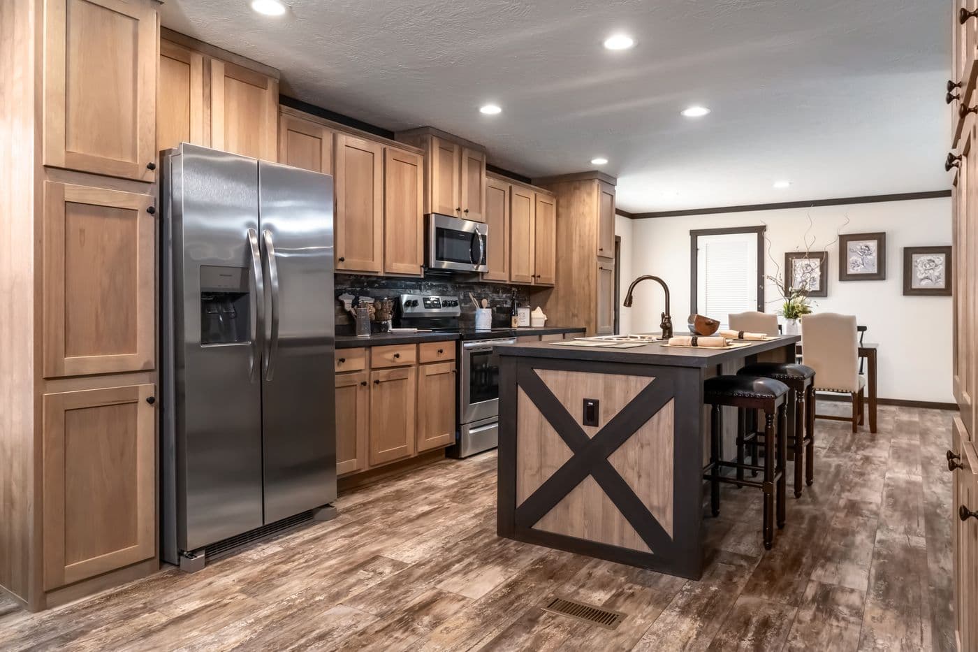 The BOUJEE 2 Kitchen. This Manufactured Mobile Home features 3 bedrooms and 2 baths.