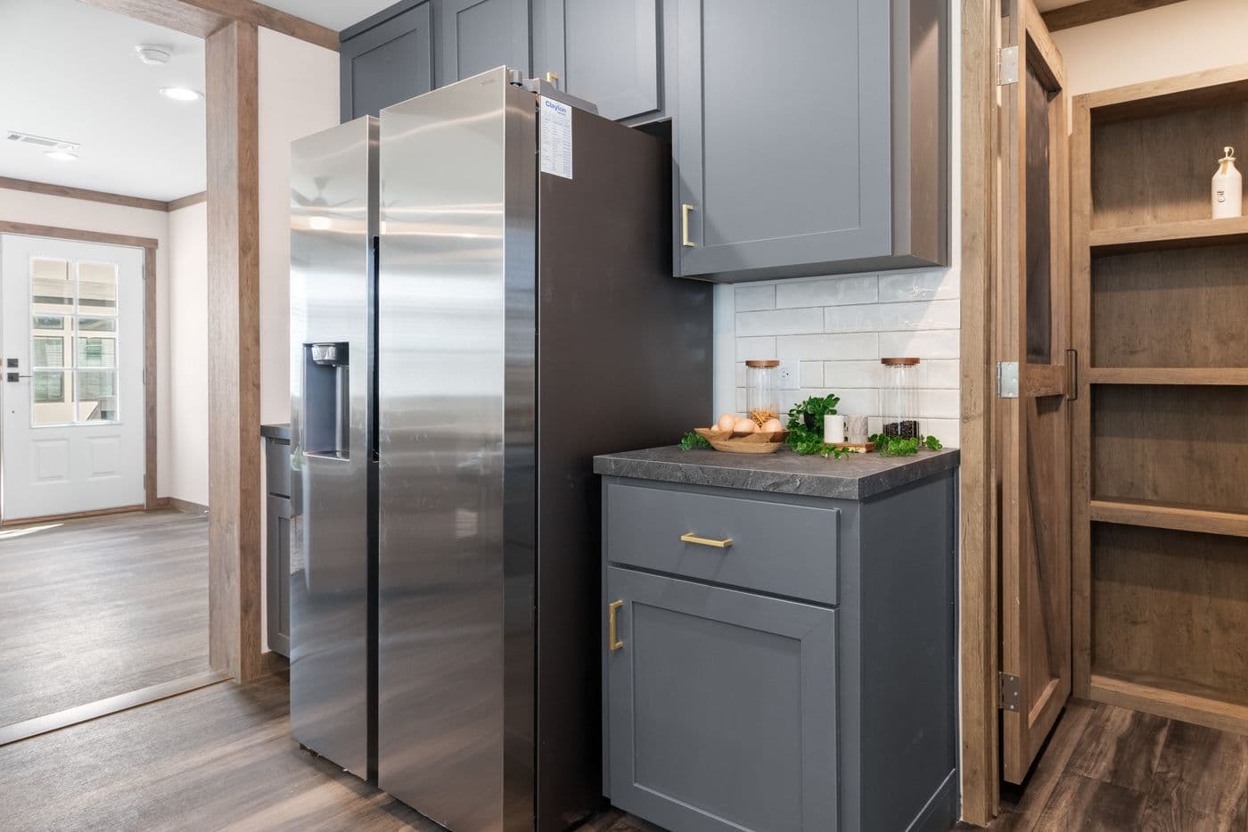 The FARM 4 FLEX Kitchen. This Manufactured Mobile Home features 4 bedrooms and 3 baths.