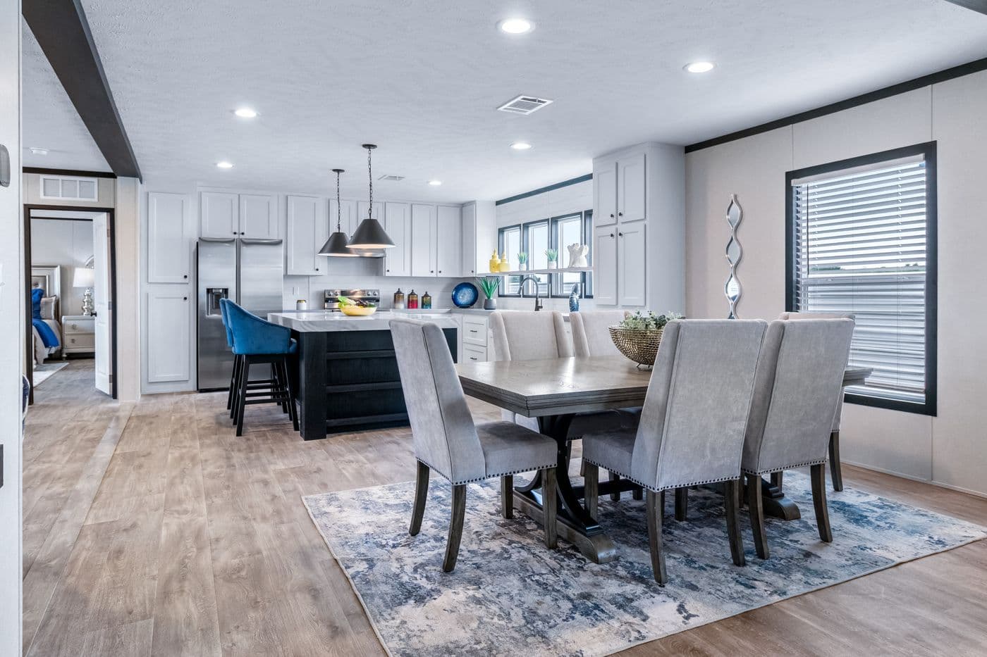 The HERCULES Dining Area. This Manufactured Mobile Home features 4 bedrooms and 2 baths.