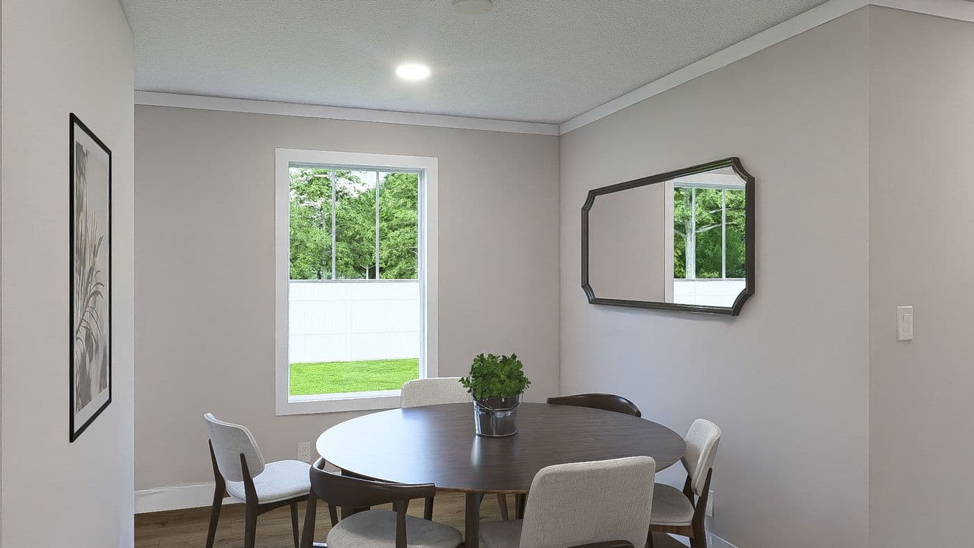 The BROWN EYED GIRL Dining Area. This Manufactured Mobile Home features 4 bedrooms and 2 baths.