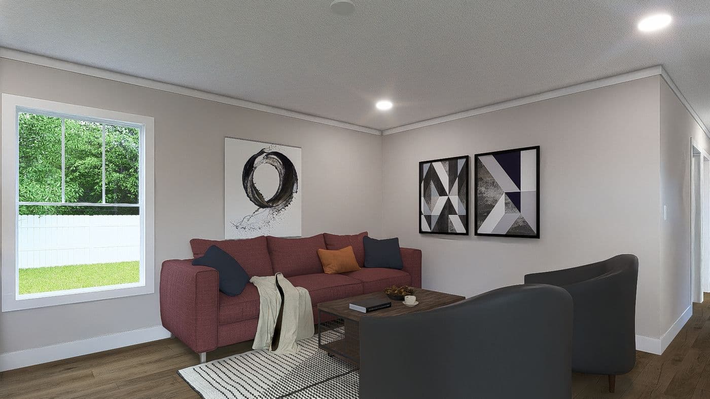 The SWEET CAROLINE Living Room. This Manufactured Mobile Home features 3 bedrooms and 2 baths.