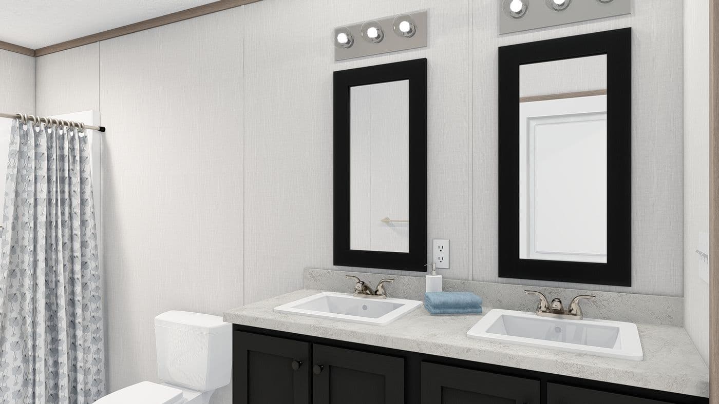 The 4428-E781 THE PULSE Primary Bathroom. This Manufactured Mobile Home features 3 bedrooms and 2 baths.