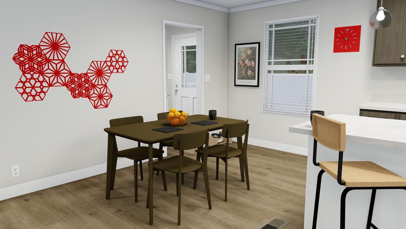 The SUNDANCE 48B Dining Area. This Manufactured Mobile Home features 3 bedrooms and 2 baths.