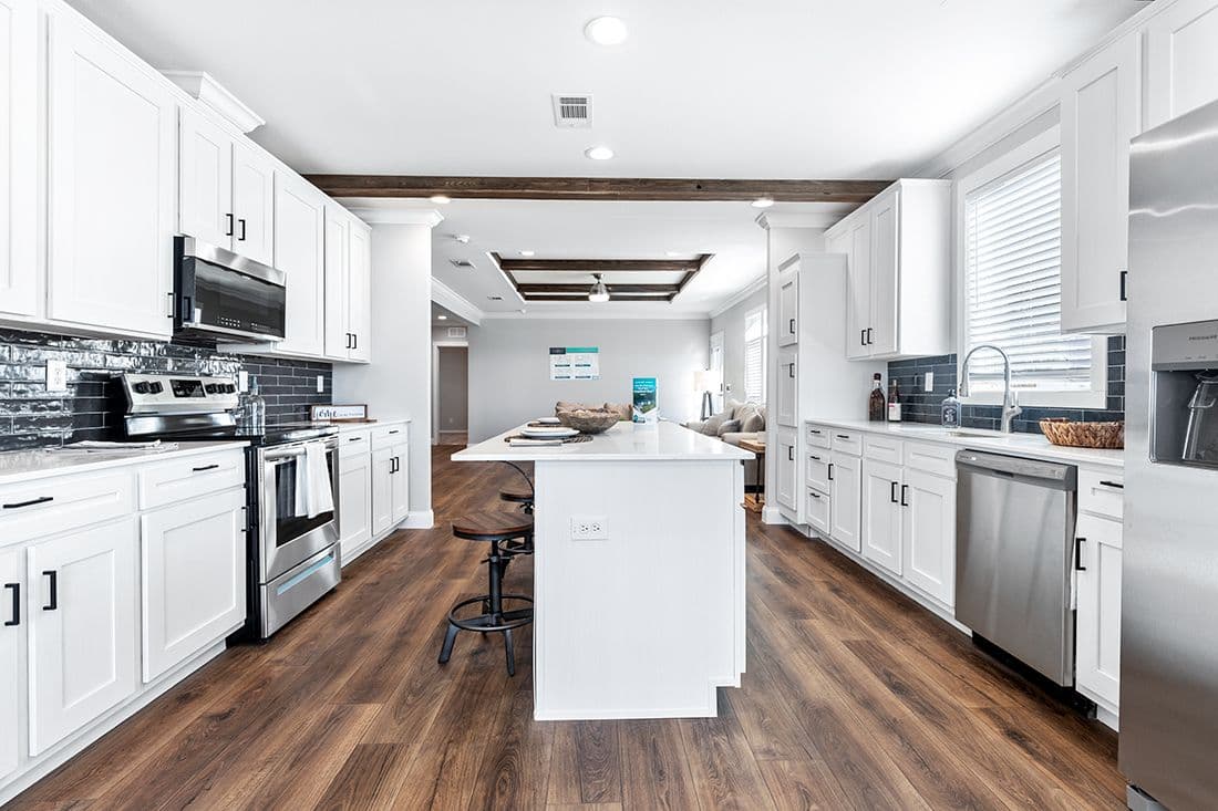 The THE VAIL Kitchen. This Manufactured Mobile Home features 3 bedrooms and 2 baths.