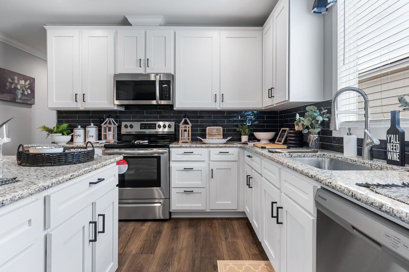 The THE MONTERREY Kitchen. This Manufactured Mobile Home features 4 bedrooms and 3 baths.