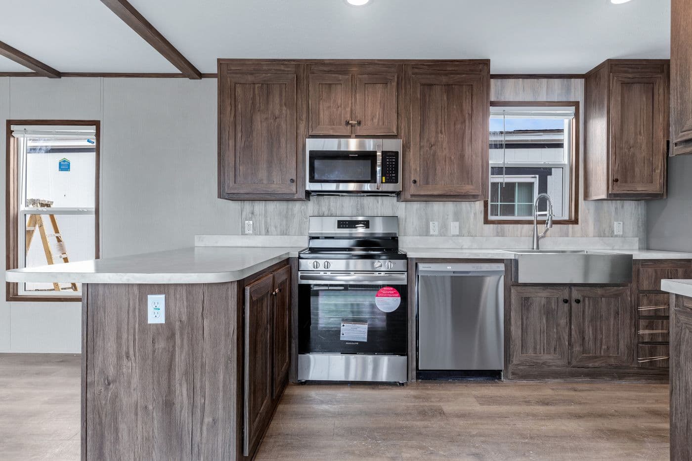 The ANNIVERSARY 16683B Dining Room. This Manufactured Mobile Home features 3 bedrooms and 2 baths.