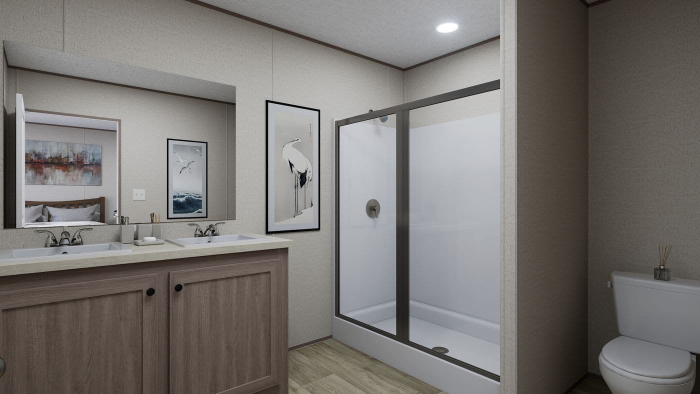 The FOOTHILLS 72 Primary Bathroom. This Manufactured Mobile Home features 3 bedrooms and 2 baths.