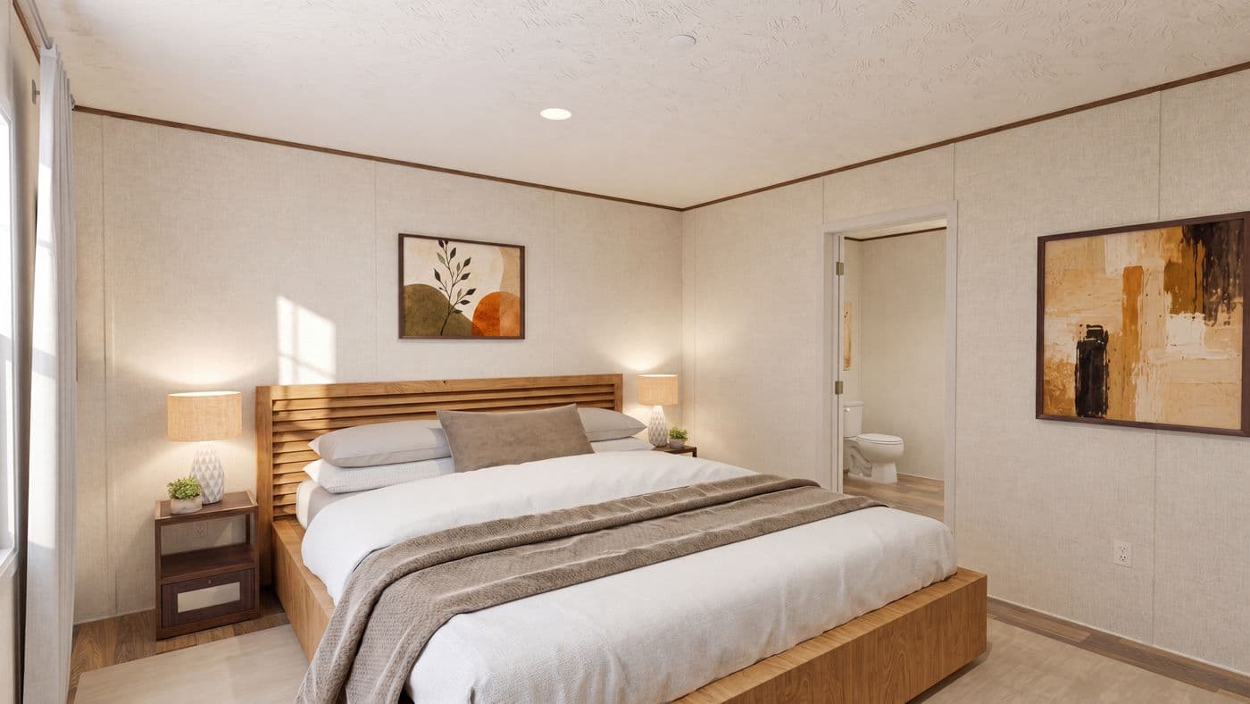 The OAK Primary Bedroom. This Manufactured Mobile Home features 4 bedrooms and 2 baths.