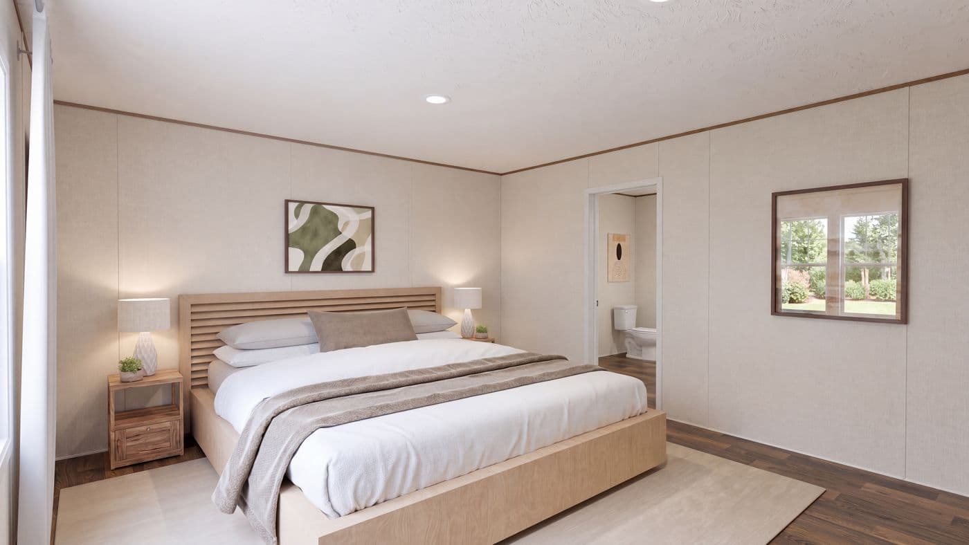 The REDWOOD Primary Bedroom. This Manufactured Mobile Home features 5 bedrooms and 3 baths.