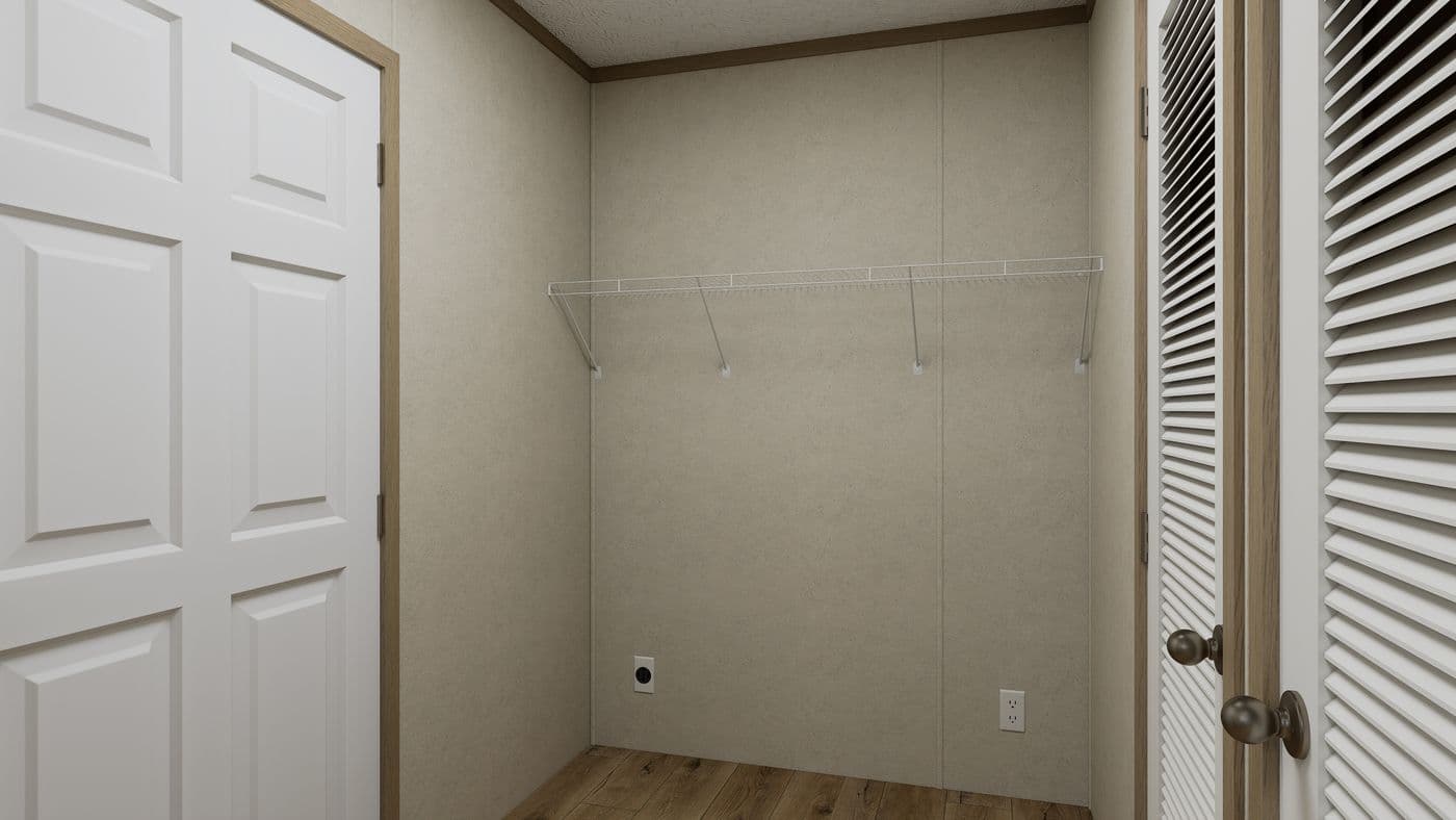 The 5624-CC56 GUARDIAN 56 Utility Room. This Manufactured Mobile Home features 3 bedrooms and 2 baths.