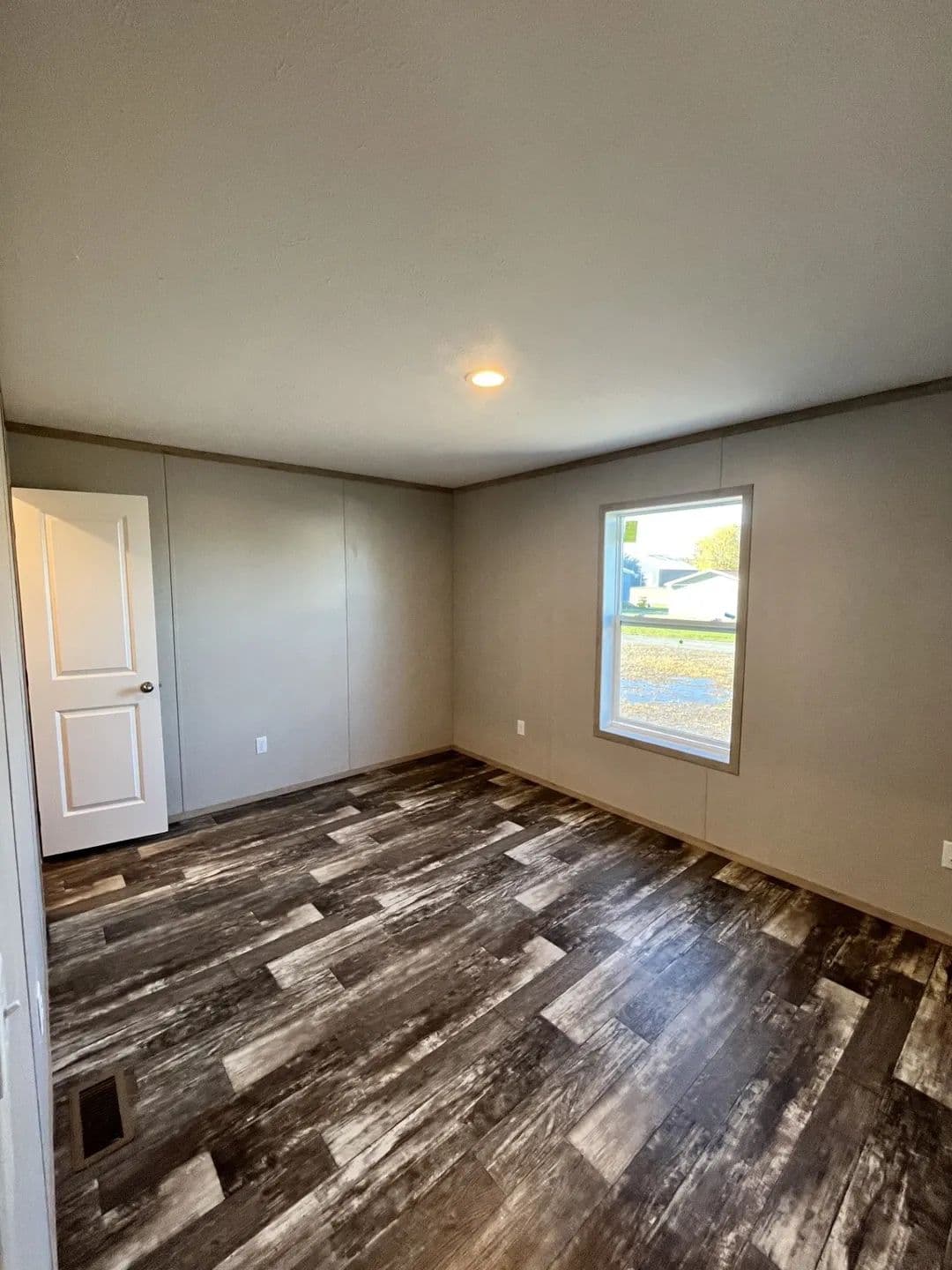 The SAPPHIRE Guest Bedroom. This Manufactured Mobile Home features 3 bedrooms and 2 baths.
