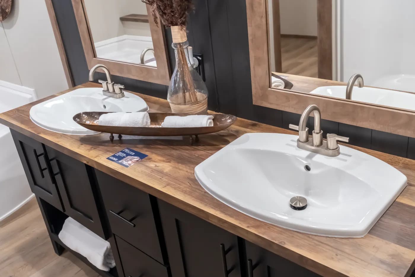 The SEVIER Primary Bathroom. This Manufactured Mobile Home features 4 bedrooms and 3 baths.