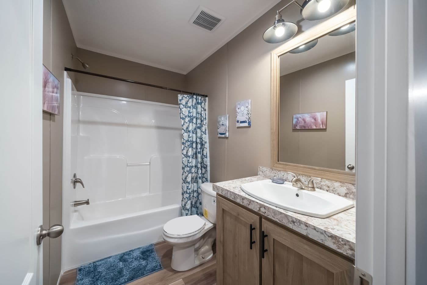 The TRADITION 56D Guest Bathroom. This Manufactured Mobile Home features 3 bedrooms and 2 baths.