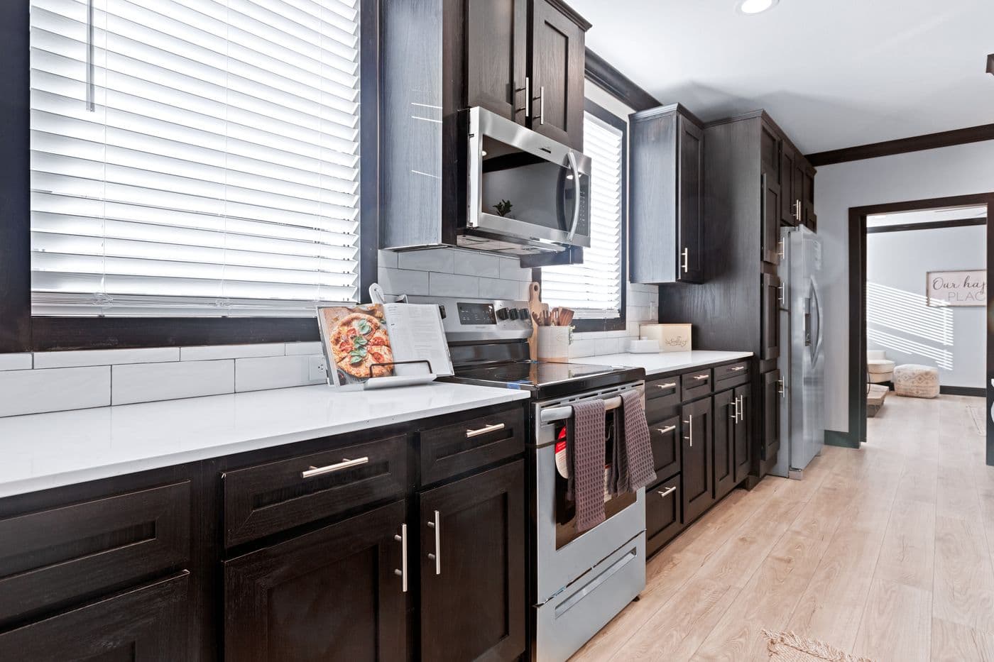 The THE LOUIS Kitchen. This Manufactured Mobile Home features 4 bedrooms and 3 baths.
